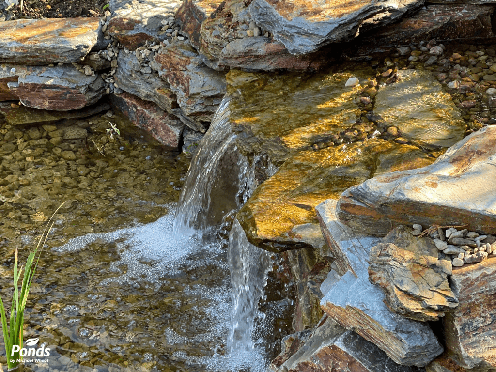 Waterfall in pond