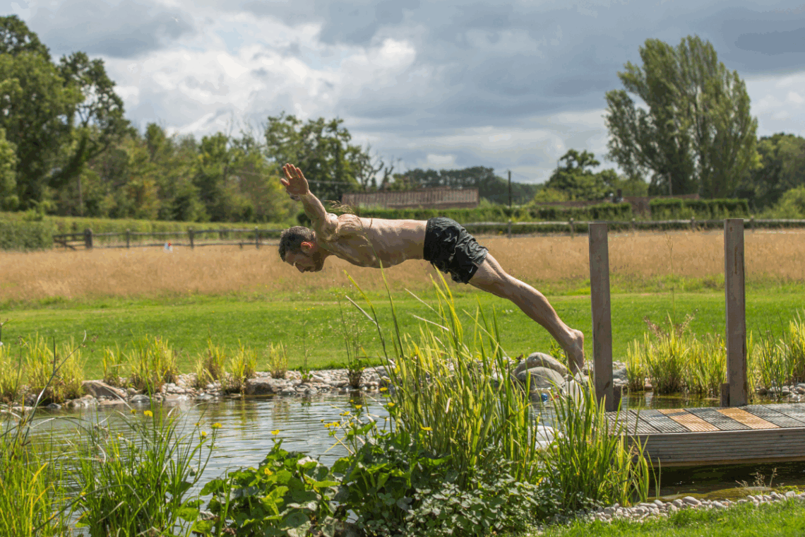 diving into swimming pond